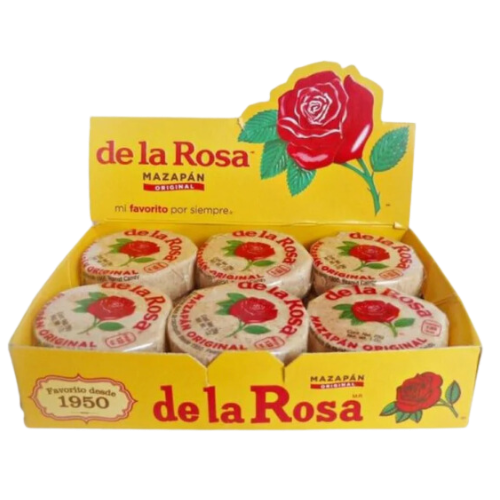 "Group of Mazapan candies arranged in a pile, showcasing their beige color and unique shape."