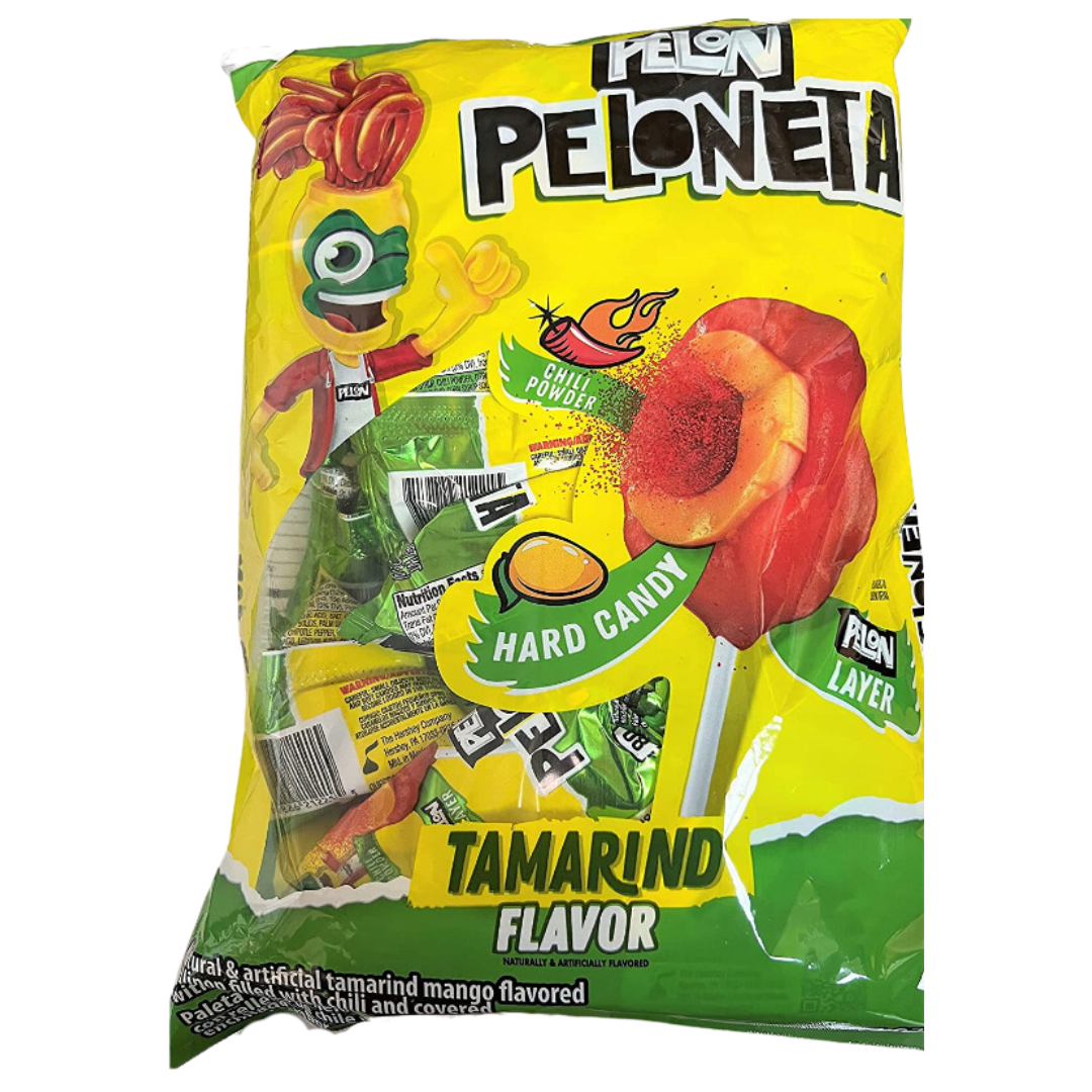 A group of small, round, tamarind-flavored lollipops, each with a straw-like opening at the top.