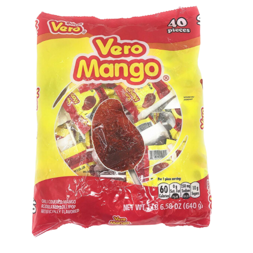 A photo of a clear plastic bag filled with small, red, rectangular-shaped candies. The candies have a slightly rough texture and appear to be coated in a light red powder. The bag has a colorful label with the brand name "Vero" and an image of a sliced mango with the words "Mango Paletas Sabor Fresa con Chile" written in bold lettering.