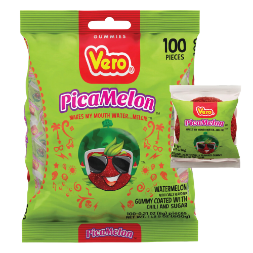 A photo of a rectangular, clear plastic package filled with 100 small, round, yellow candies. The candies have a soft, gummy texture and are coated with a reddish-pink powder. The package has a label with the brand name "Vero" and the product name "Picamelon" in bold letters, along with an image of a cartoon character with a surprised expression on its face.