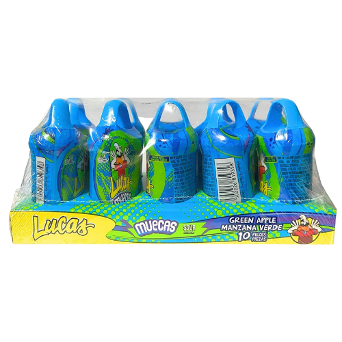 The candy consists of small, green, apple-flavored powder packets that are meant to be sprinkled on other foods or eaten directly from the packet. The package features images of green apples and a cartoon character with a surprised expression on their face.