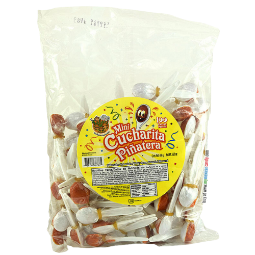 A clear plastic bag filled with small, brown, spoon-shaped candies. The candies are tamarind flavored and have a slightly glossy texture. The bag has a colorful label with the brand name "Safari" and an image of a cartoon elephant. The label also indicates that the candies are "mini" sized.
